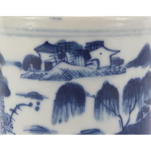 592 - Chinese blue and white porcelain mug hand painted with figures in a landscape, 9.5cm high