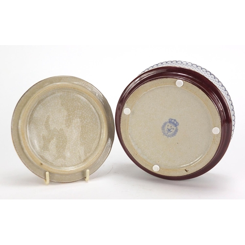 2458 - Continental porcelain box and cover surmounted with a bronze lizard, 13.5cm in diameter