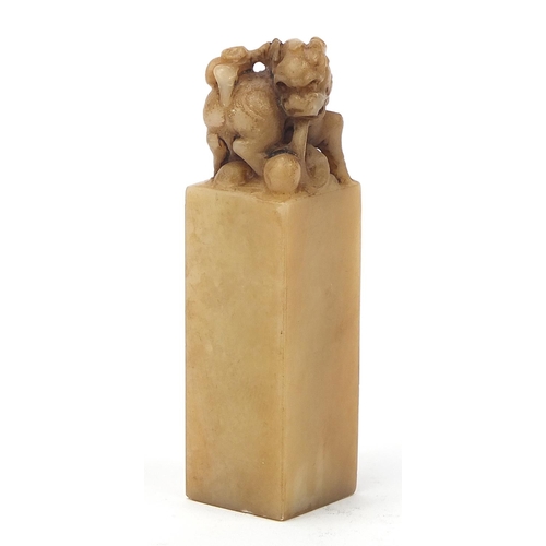 2428 - Chinese soapstone seal carved with a dog of Foo, character marks to the base, 9.5cm high