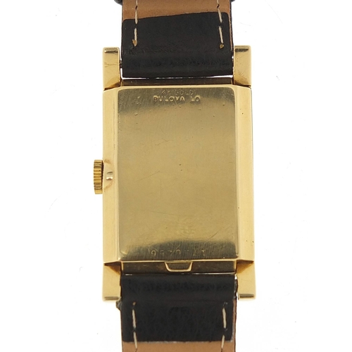 132 - Bulova, 14ct gold gentlemen's manual wristwatch with subsidiary dial, the case 21mm wide