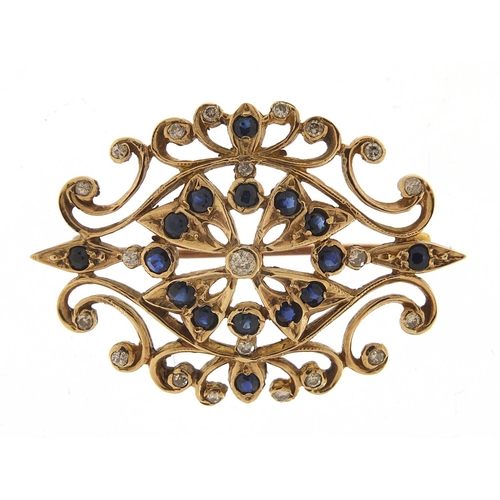 290 - 9ct gold diamond and sapphire cluster pierced brooch, the central diamond approximately 2.0mm in dia... 