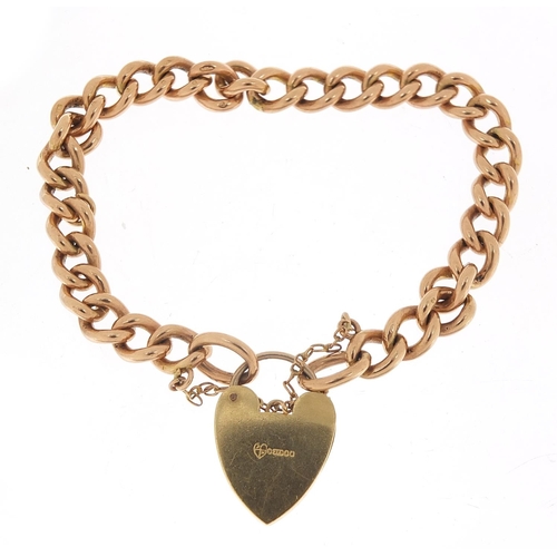 216 - 9ct rose gold charm bracelet with love heart padlock, 18cm in length, 26.5g