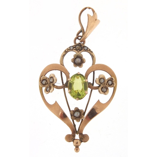 261 - Art Nouveau 9ct gold peridot and seed pearl pendant, 4cm high, 1.7g