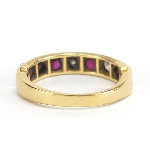 53 - 18ct gold diamond and ruby half eternity ring, the diamonds approximately 3.2mm in diameter, size R,... 