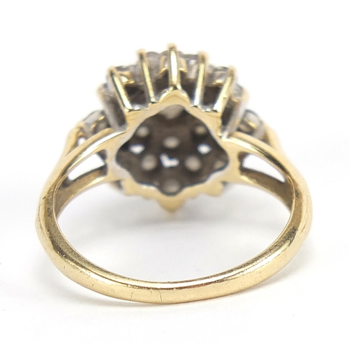 188 - Unmarked gold diamond four tier cluster ring, approximately 1.00 carat in total, size K, 4.2g