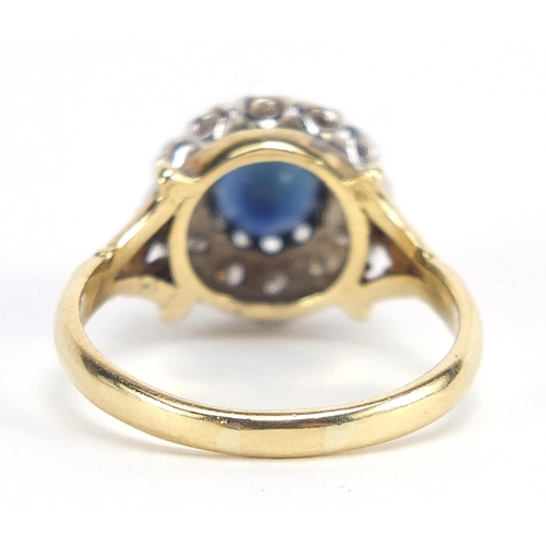 311 - 18ct gold sapphire and diamond ring, the sapphire approximately 5.0mm in diameter, size Q, 5.3g