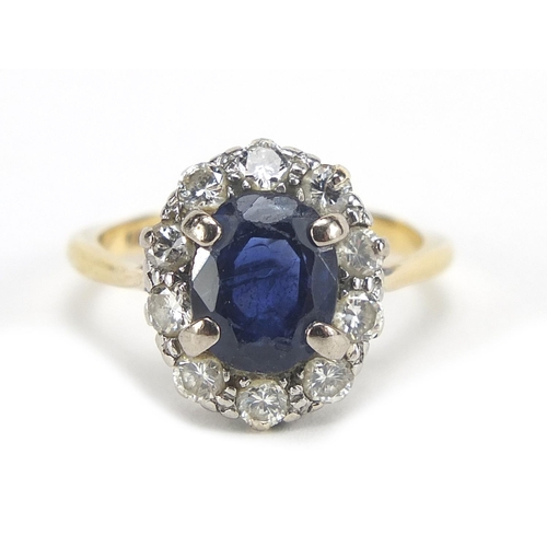 291 - 18ct gold sapphire and diamond ring, the sapphire approximately 8.5mm x 6.8mm, the diamonds approxim... 