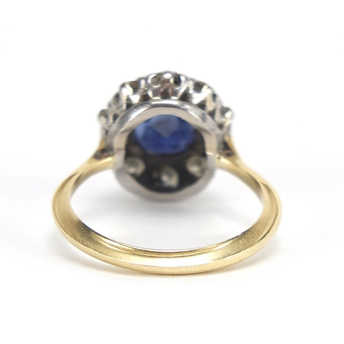 291 - 18ct gold sapphire and diamond ring, the sapphire approximately 8.5mm x 6.8mm, the diamonds approxim... 