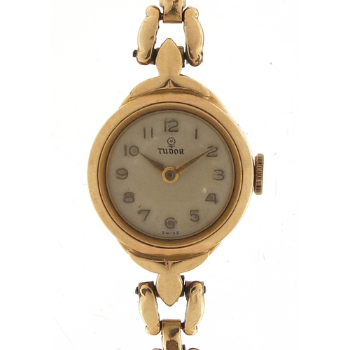 429 - Tudor, ladies 9ct gold wristwatch with gold plated strap, 18.8mm in diameter