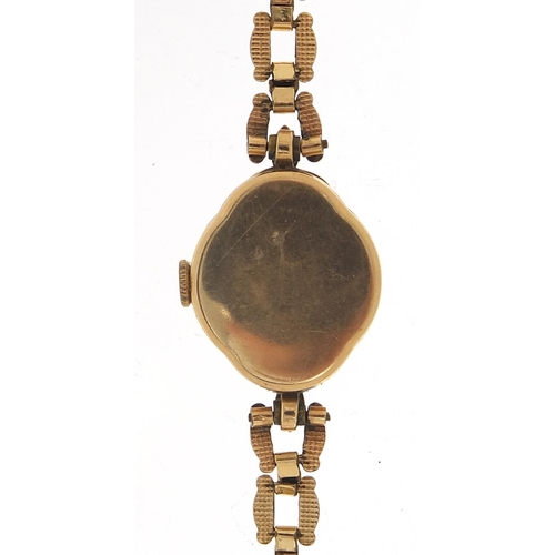 429 - Tudor, ladies 9ct gold wristwatch with gold plated strap, 18.8mm in diameter