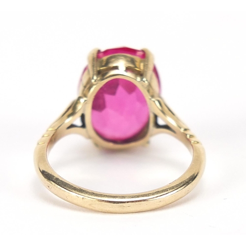 34 - Unmarked gold ruby solitaire ring, the stone approximately 14.5mm x 10mm x approximately 6mm deep, 4... 