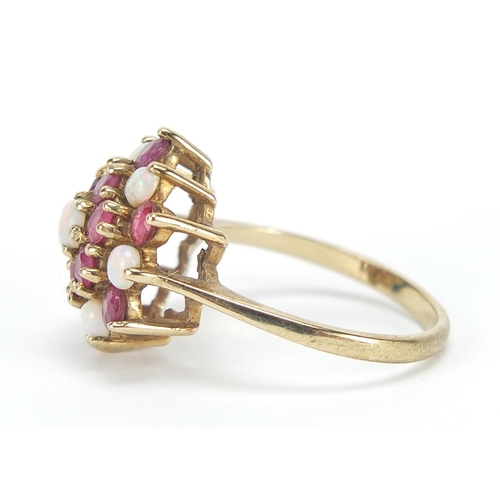 398 - 9ct gold opal and ruby three tier cluster ring, size O, 3.6g