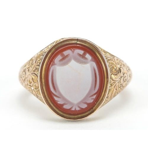 64 - Victorian 9ct gold carnelian cameo seal ring with floral engraved shoulders, London 1862, size M/N, ... 