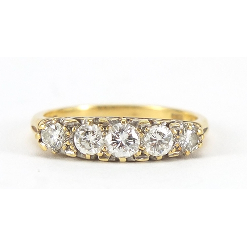 173 - 18ct gold diamond five stone ring, the centre diamond approximately 3.8mm in diameter, size N, 4.0g