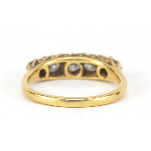 173 - 18ct gold diamond five stone ring, the centre diamond approximately 3.8mm in diameter, size N, 4.0g