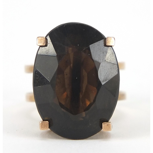 345 - Large 14ct gold smoky quartz ring, the stone approximately 23mm x 17mm x 11mm deep, size P, 12.8g