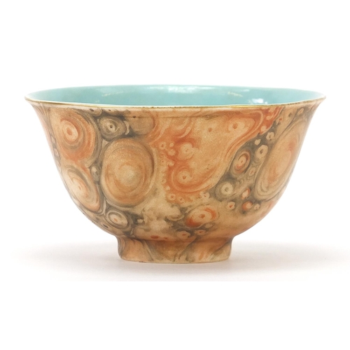 517 - Chinese faux bois porcelain bowl, four figure iron red character marks to the base, 10cm in diameter