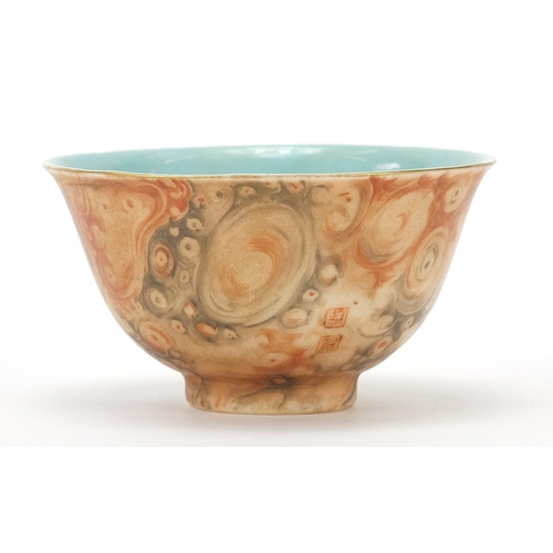 517 - Chinese faux bois porcelain bowl, four figure iron red character marks to the base, 10cm in diameter