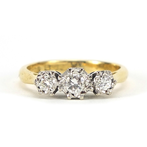 313 - 18ct gold diamond three stone ring, the central diamond approximately 3mm in diameter, size L, 3.8g