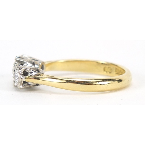 313 - 18ct gold diamond three stone ring, the central diamond approximately 3mm in diameter, size L, 3.8g