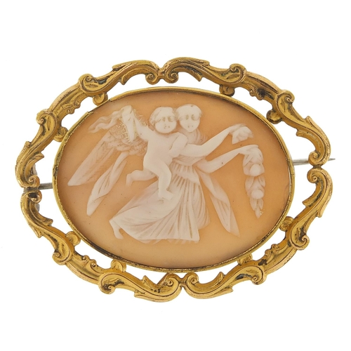 421 - Large Victorian gold coloured metal cameo brooch depicting a maiden and Putti, 6cm wide, 13.8g