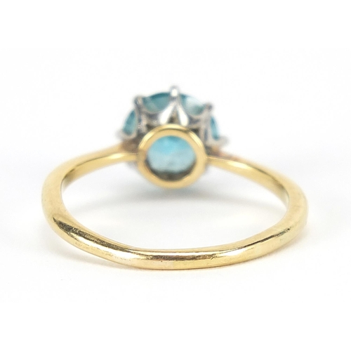 402 - 18ct gold blue stone solitaire ring, possibly aquamarine, size L, 3.2g