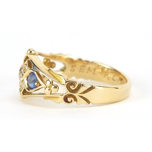 88 - Edwardian 18ct gold diamond and sapphire ring with pierced ornate setting, the central diamond appro... 