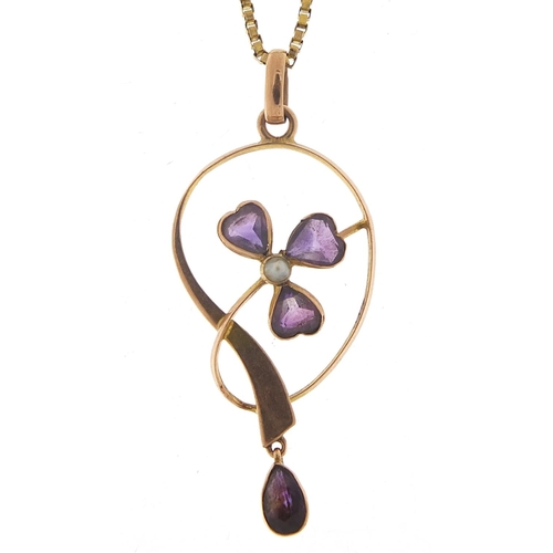 424 - Art Nouveau 9ct gold amethyst and seed pearl pendant on a 9ct gold necklace, 4cm high and 60cm in le... 