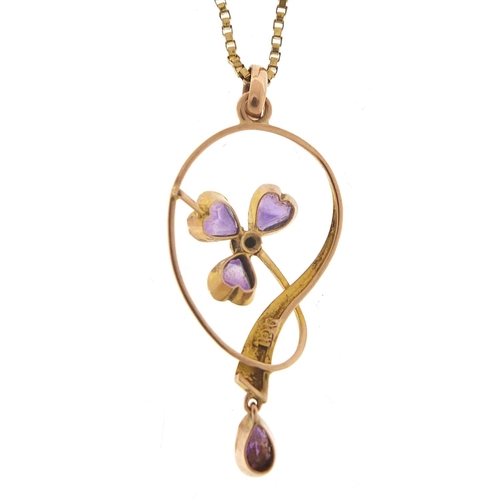 424 - Art Nouveau 9ct gold amethyst and seed pearl pendant on a 9ct gold necklace, 4cm high and 60cm in le... 