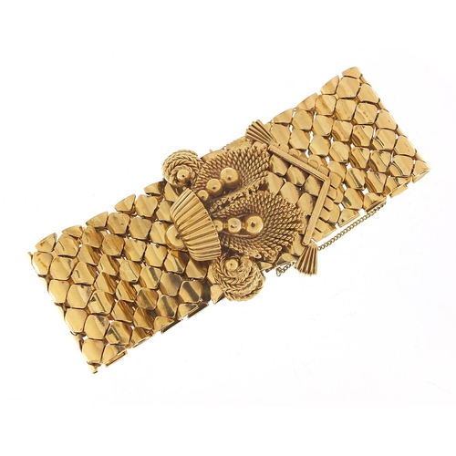 11 - Large 9ct gold belt and buckle design bracelet with floral basket design clasp, S & SLD maker's mark... 