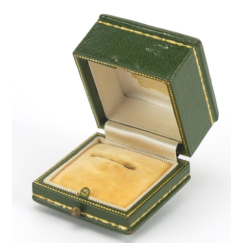 419 - Cartier, tooled green leather ring box with velvet and silk lined interior, 3.8cm D x 4.5cm W x 4.5c... 