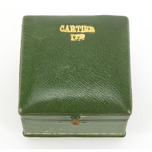 419 - Cartier, tooled green leather ring box with velvet and silk lined interior, 3.8cm D x 4.5cm W x 4.5c... 