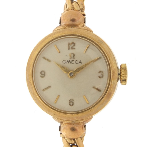 219 - Omega, ladies 9ct gold manual wind wristwatch with 9ct gold strap, the movement numbered 16425764, 1... 