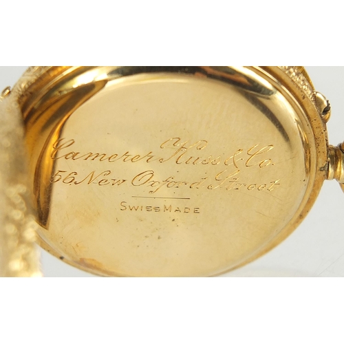 98 - Camerer Cuss & Co, 18ct gold ladies open face pocket watch with ornate enamelled dial and chased cas... 