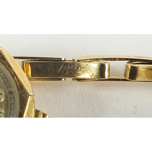 256 - Ladies 18ct gold wristwatch with 18ct gold strap, the case 20mm wide, 17.0g