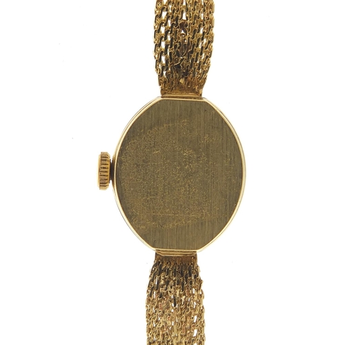 423 - Commodoor ladies 14ct gold wristwatch with 14ct gold strap, the case 13.8mm wide, 11.4g