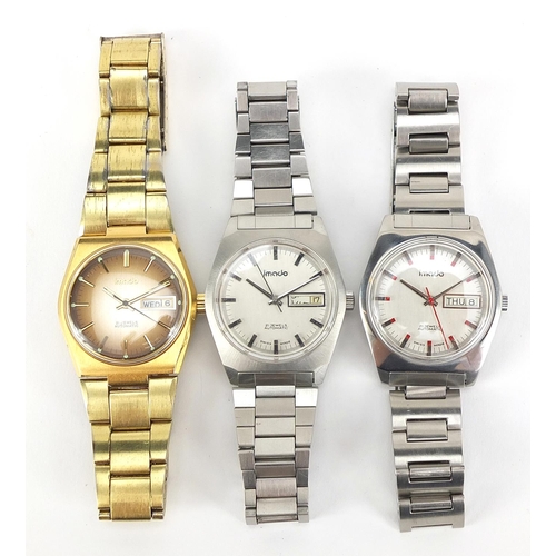 412 - Imado, three gentlemen's automatic day date  wristwatches