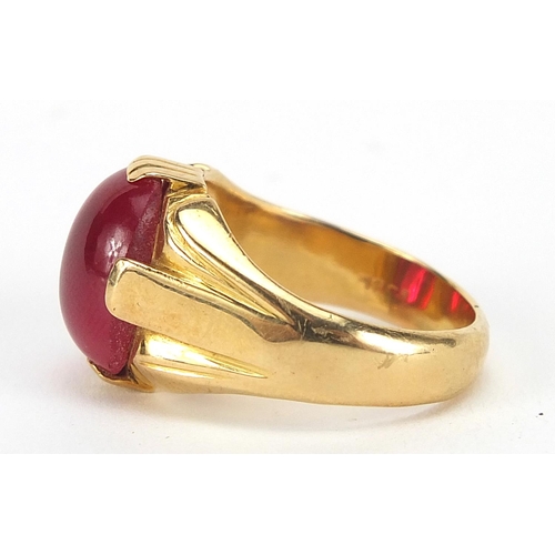 90 - 18ct gold cabochon ruby ring, the stone 14mm x 10.5mm x 5.8mm deep, size T, 13.0g