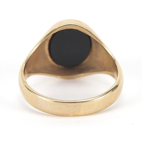 319 - 9ct gold and black onyx masonic signet ring, size T, 5.3g