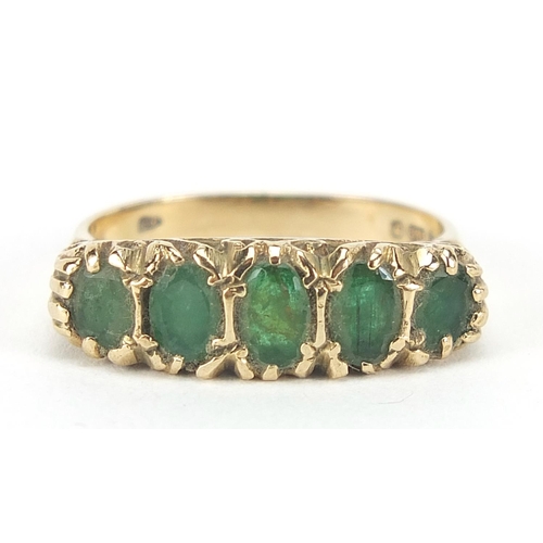 211 - 9ct gold graduated emerald five stone ring, size N, 3.8g