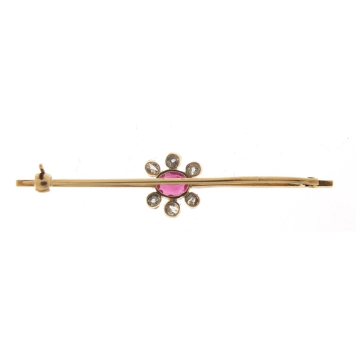 91 - 9ct gold ruby and diamond bar brooch, the ruby approximately 4.5mm x 4mm, the larger diamond approxi... 