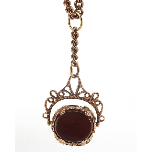 351 - Victorian 9ct gold watch chain with bloodstone, onyx and carnelian spinner fob, 46cm in length, the ... 