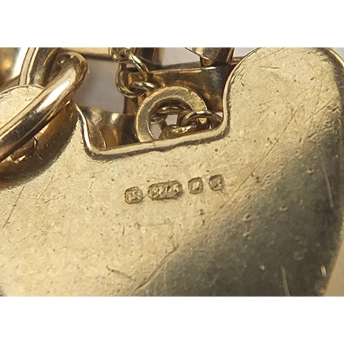 287 - 9ct gold eight row gate bracelet with love heart padlock and America 1945 dos peso gold coin charm, ... 