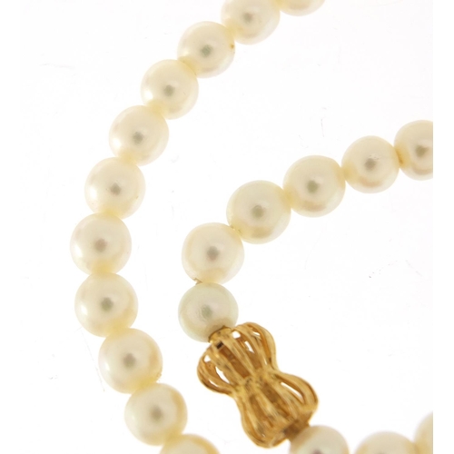 305 - 18ct gold and diamond pearl necklace housed in a Mappin & Webb velvet and silk lined box, 40cm in le... 