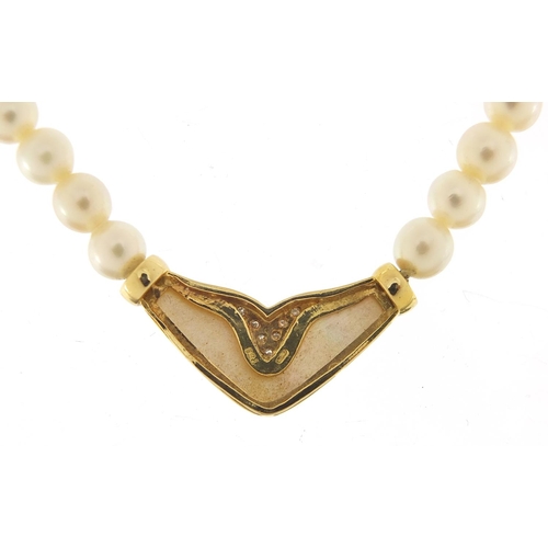 305 - 18ct gold and diamond pearl necklace housed in a Mappin & Webb velvet and silk lined box, 40cm in le... 