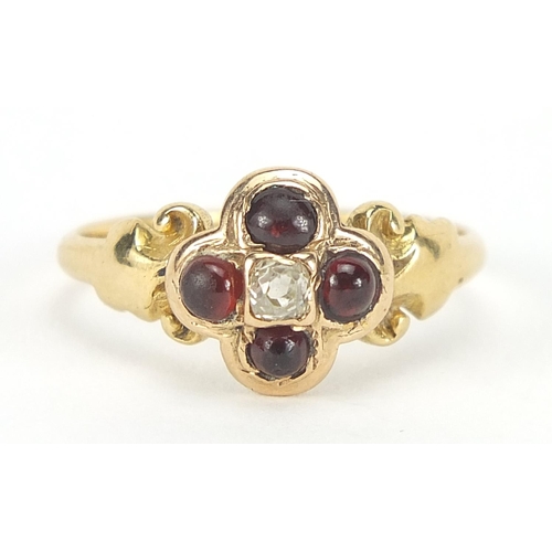 267 - 18ct gold diamond and cabochon garnet mourning ring with scrolled shoulders and indistinct inscripti... 