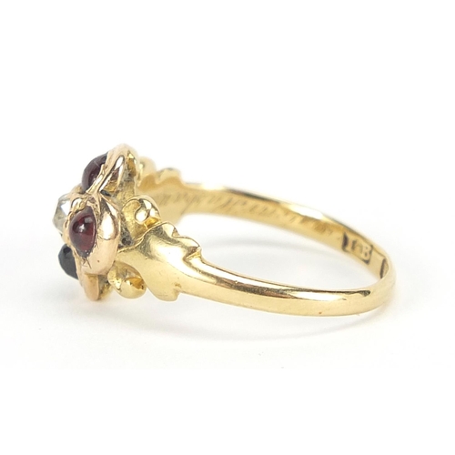 267 - 18ct gold diamond and cabochon garnet mourning ring with scrolled shoulders and indistinct inscripti... 