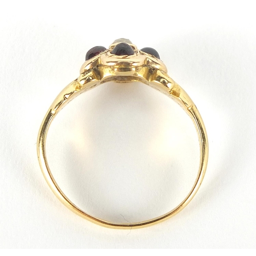 267 - 18ct gold diamond and cabochon garnet mourning ring with scrolled shoulders and indistinct inscripti... 