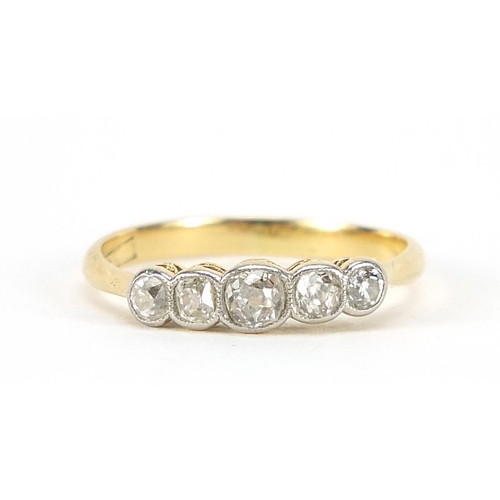 152 - 18ct gold graduated diamond five stone ring, the central diamond approximately 2.7mm x 2.5mm, size M... 