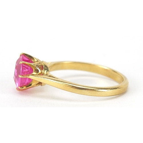 49 - 18ct gold ruby solitaire ring, the stone approximately 8mm in diameter, size N, 3.7g